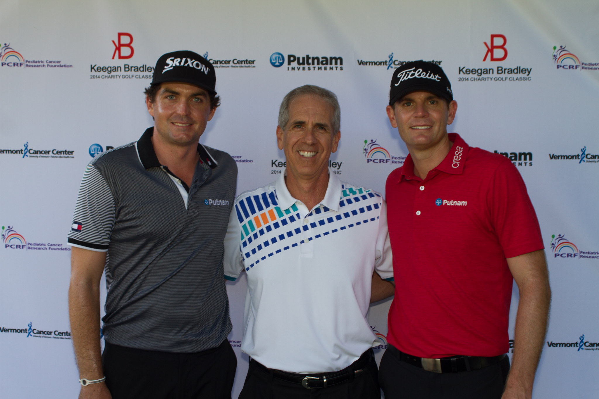 Crowd of onlookers near the Putnam Investments sign